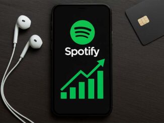 Interface Spotify sur smartphone avec graphique en hausse, symbolisant l’achat de streams et les stratégies de promotion musicale.